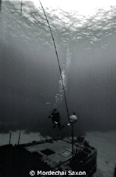 15mm lens with Nikonos V, no strobe.  The wreck off the s... by Mordechai Saxon 